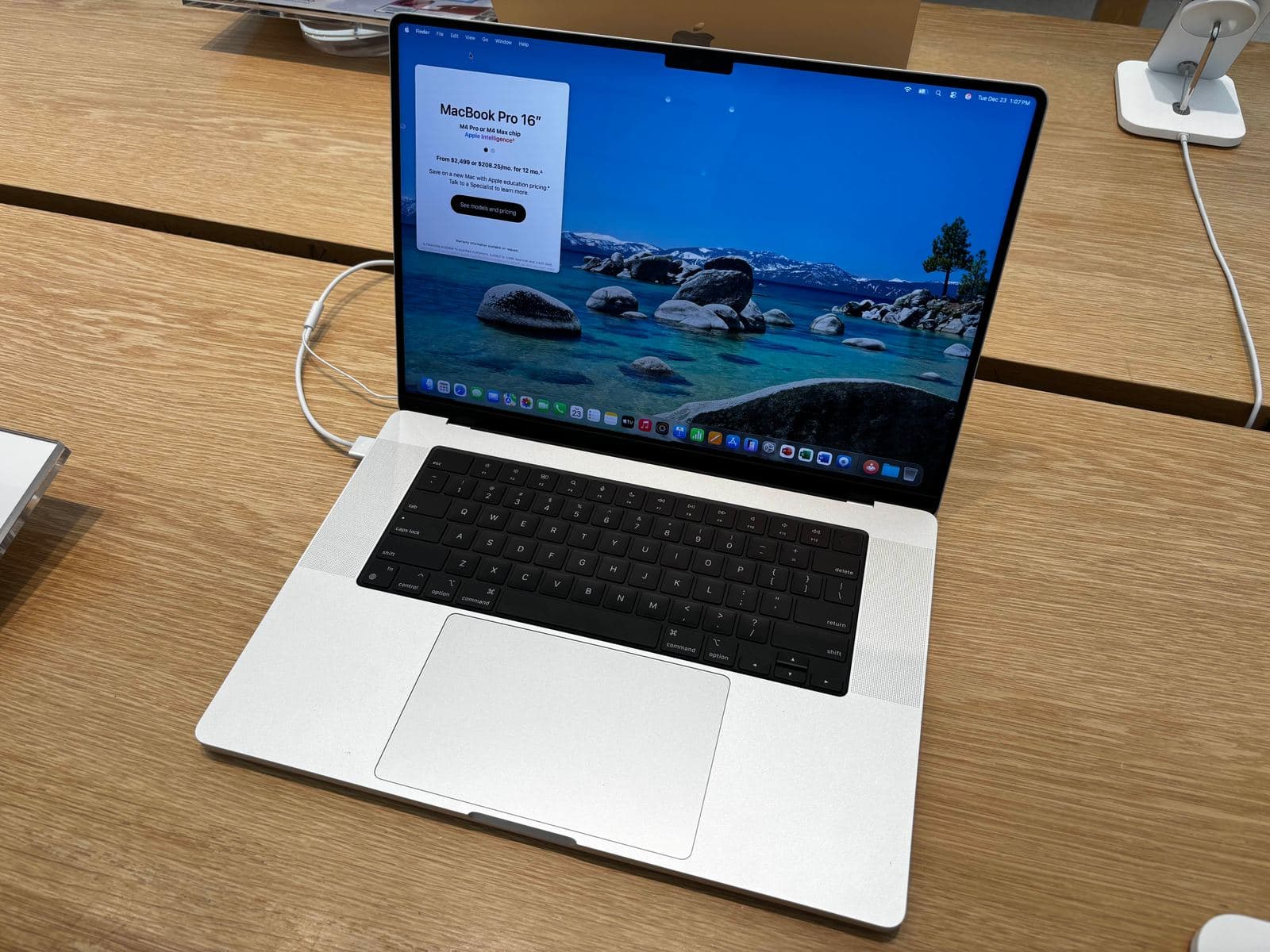 Silver 16-inch MacBook Pro, the current model with the M4 Pro chip, on display in an Apple Store